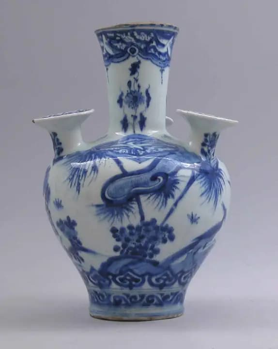 Blue and white vase with spouts for single stems